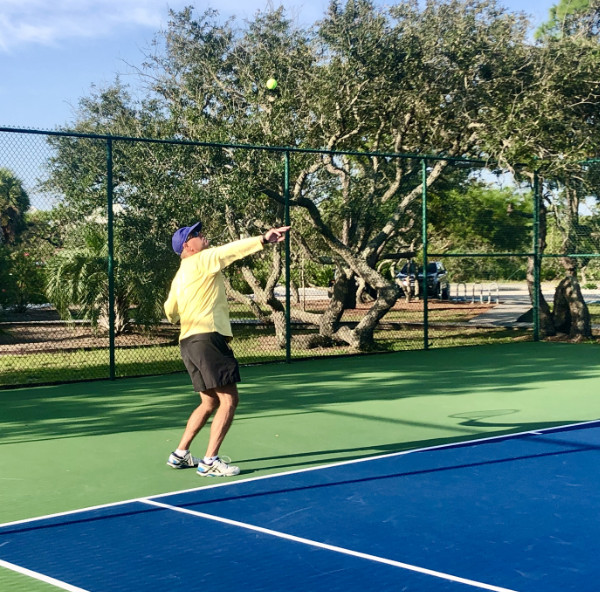 A man playing tennis.